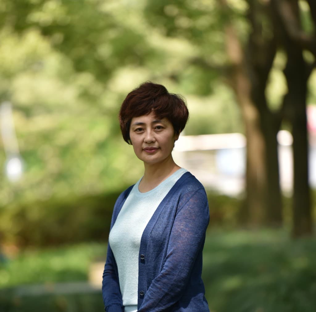 Portrait of Xuhui Xu, Chief Financial Officer